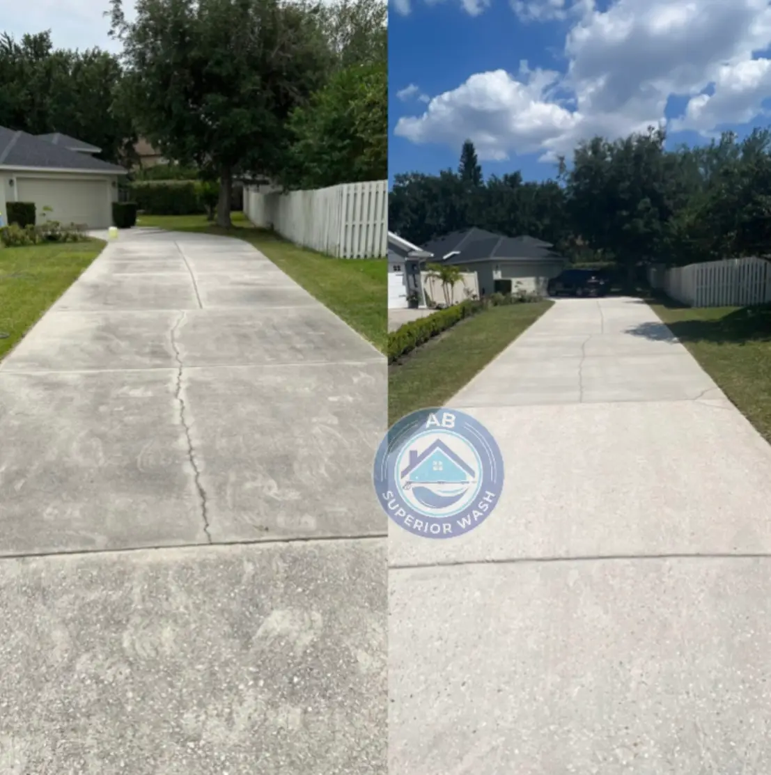 Concrete driveway in Orlando before and after pressure washing, with dirt and stains cleaned back to bright concrete